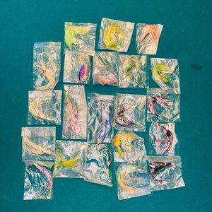 LOT OF 21 VIMTAGE PRE-RIGGED TINSEL AND RUBBER SQUID FISHING LURES